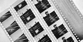 [Photo of the three film strips and mag
track]
