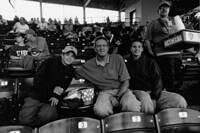 My cousin Chris, uncle Ed, and cousin Alec Thompson at a Cubs game (note the guy selling $5.25 beer!) (June, 2004)