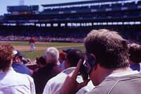 Idiot on his cell phone during a baseball game (summer, 2003)